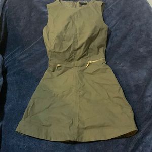 It is an army green dress of the H&M brand.